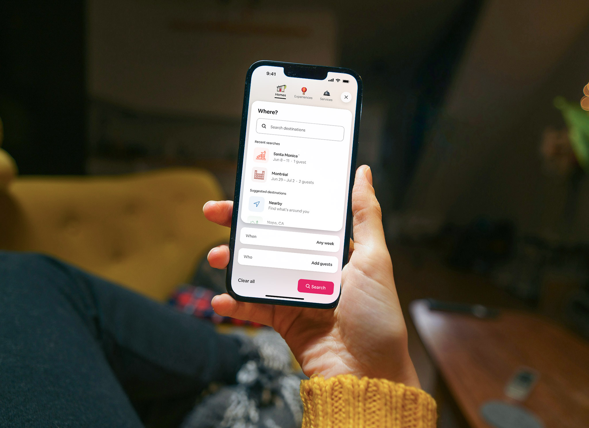 iPhone 13 Pro showing the Airbnb search input screen. Photo by Jakub Żerdzicki