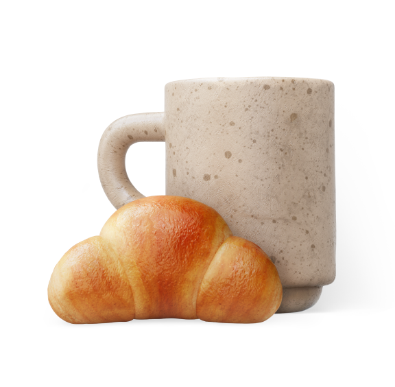 Coffee cup and croissant